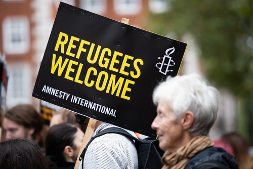 What are the benefits of asylum in the UK?