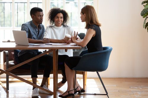 Solicitor having a meeting with clients