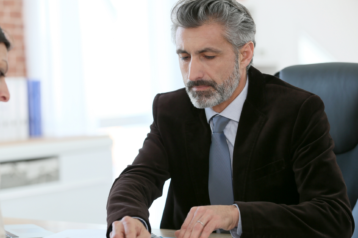 Solicitors reviewing documents